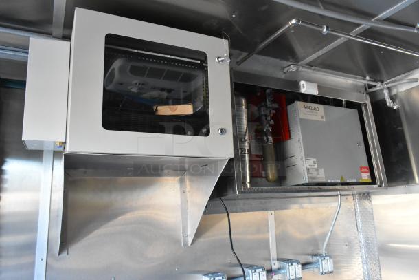Brand new 2021 Cruising Kitchens 24' mobile kitchen interior with commercial CaptiveAire grease hood and fire suppression system.