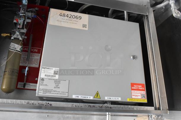 CaptiveAire control panel in a 2021 Cruising Kitchens 24' Burger King food trailer, featuring a fire suppression system.