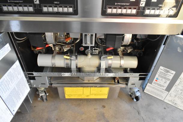 2021 Frymaster FPPH255CSE stainless steel propane gas deep fat fryer, 4 metal baskets, filtration system, on casters, 80,000 BTU.