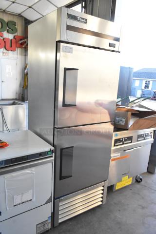 Brand new 2021 True T-23F-2-HC-MC commercial freezer with two half-size doors, poly-coated racks, 115V, 1 Phase, minor dents.