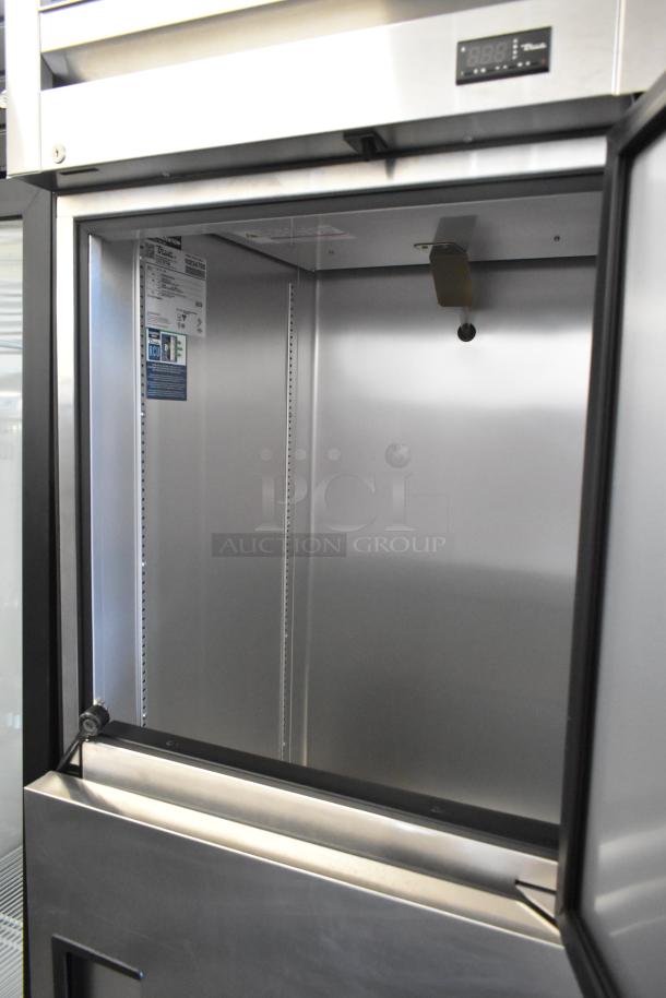 Brand new 2021 True T-23-2-HC cooler, 2 half-size doors, poly-coated racks, 115V, 1 phase, scratch-and-dent condition.