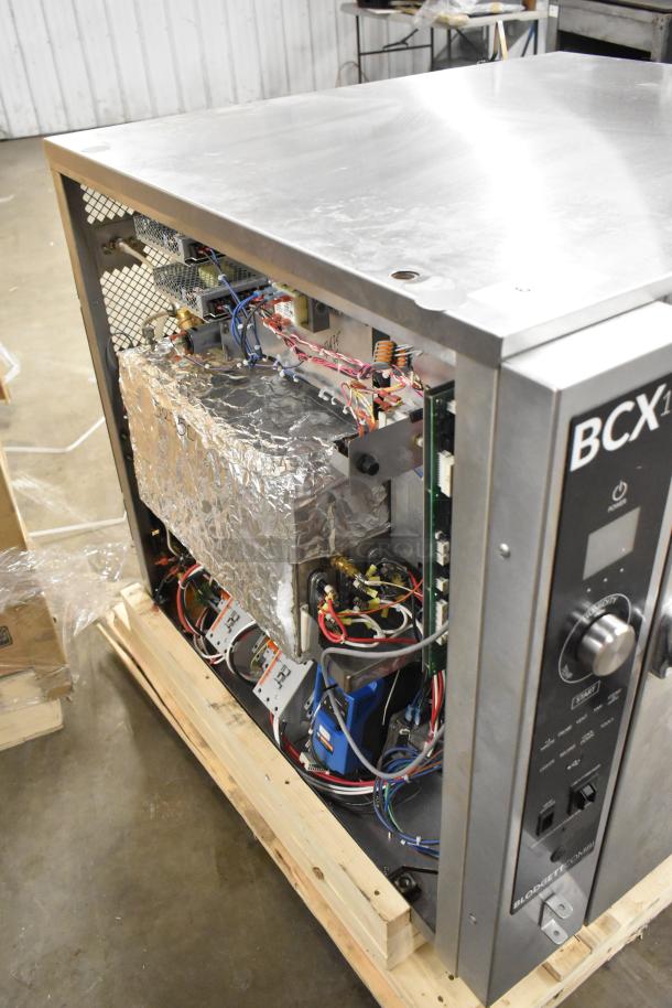 2025 Blodgett BCX-14E commercial electric combi convection oven, 208V, 3 phase, open side panel showing internal components.