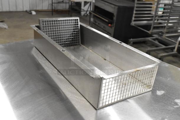 Stainless-steel part of Blodgett BCX-14E oven, featuring durable grid design, in used condition.