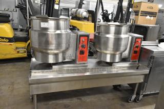 Vulcan steam table station with two 2016 Vulcan K12ETT 12-gallon tilting electric kettles on casters. 208/240V, 3/1 phase.