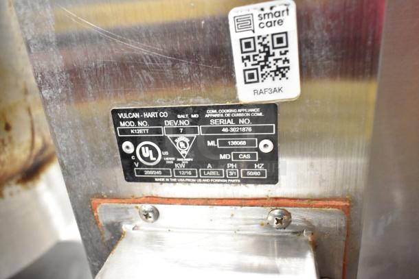 Vulcan K12ETT commercial label on steam table station, showing model and serial numbers, electrical specs: 208/240V, 3/1 phase.