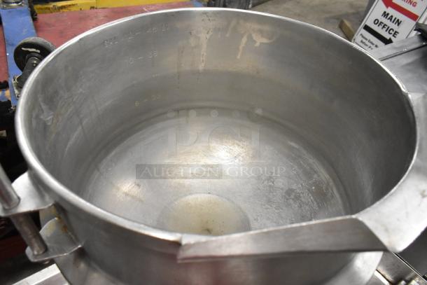Vulcan K12ETT 12-gallon tilting electric steam jacketed kettle interior. Features volume markings; used condition.