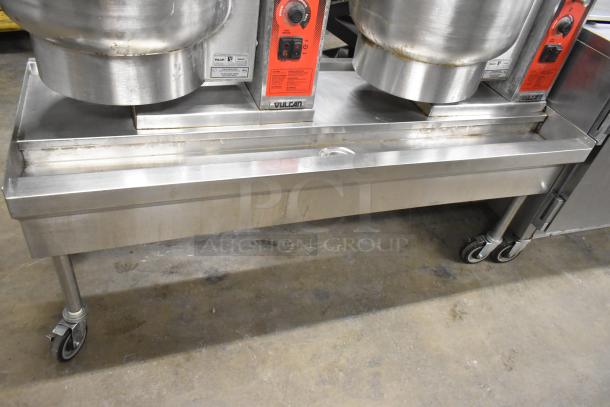 Vulcan steam table station with two 2016 K12ETT 12-gallon tilting electric kettles, 208/240V, on commercial casters.
