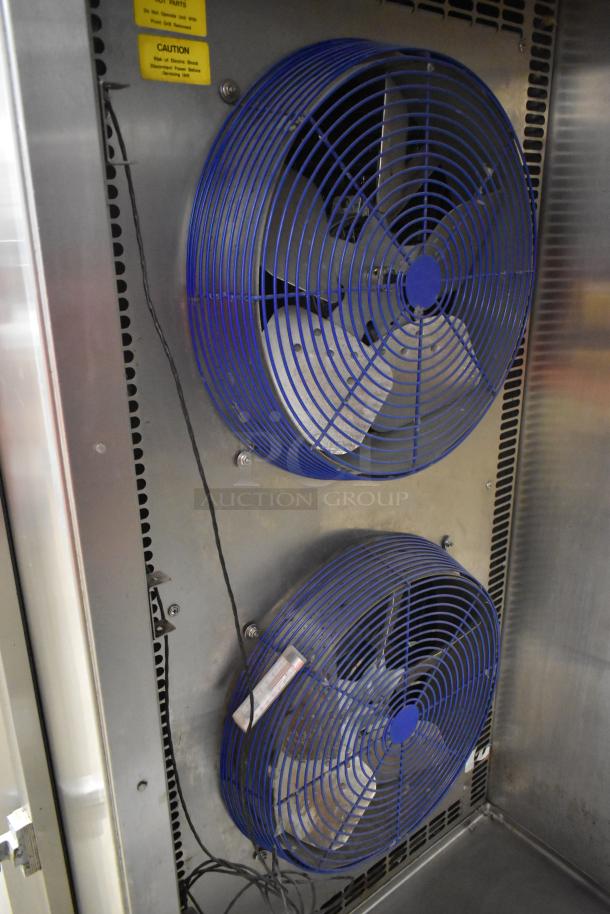 Alto Shaam stainless steel blast chiller with dual blue fans. Includes two probes, caution labels visible, in good condition.
