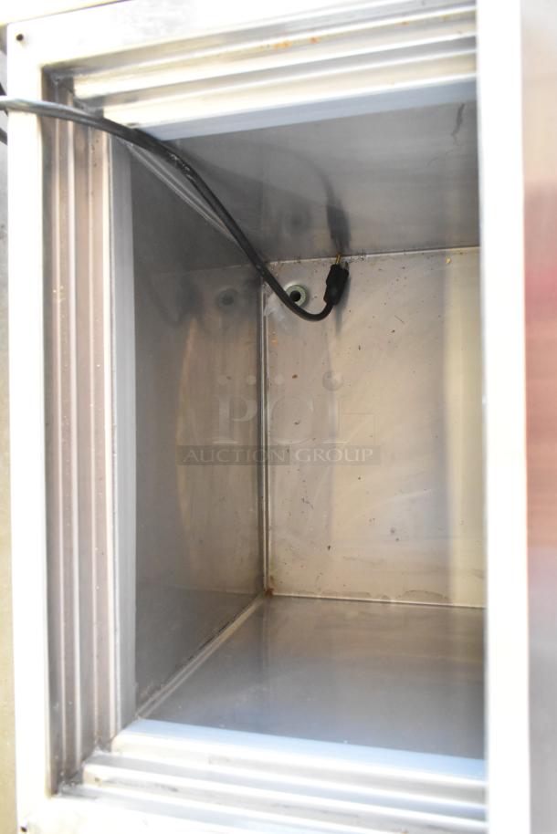 2021 H&K 52473-1 stainless steel commercial French fry freezer interior, features fry basket holder, on commercial casters.