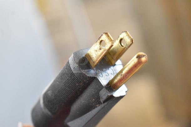Power plug for 2021 H&K 52473-1 Stainless Steel French Fry Freezer, featuring 115 Volts, 1 Phase. Close-up view.