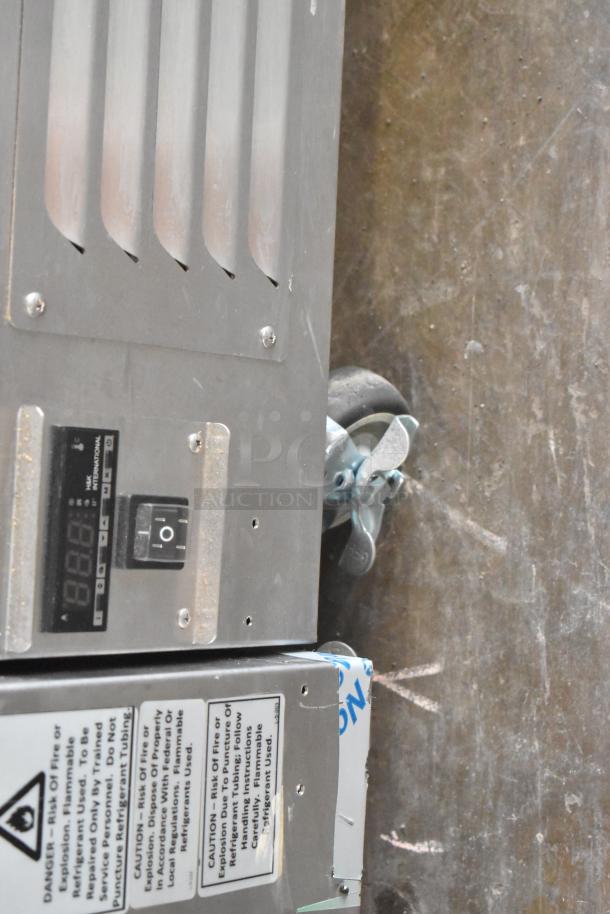 2021 H&K 52473-1 stainless steel French fry freezer, digital display, commercial casters, caution labels.