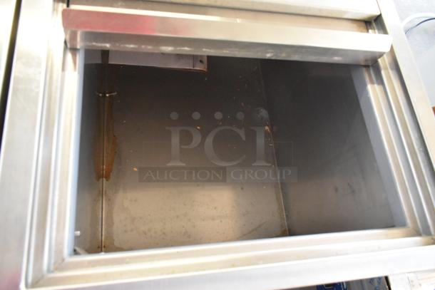 2021 H&K 52473-1 stainless steel french fry freezer interior. Used condition. Includes fry basket holder, commercial casters.