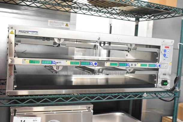 Prince Castle EHB24 commercial holding bin with 2 shelves for 8 pans, 208-240V, 1 phase. Features control panel and branding.