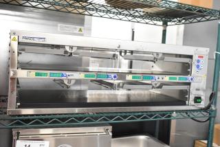 Prince Castle EHB24 commercial holding bin with 2 shelves for 8 pans, 208-240V, 1 phase. Features control panel and branding.