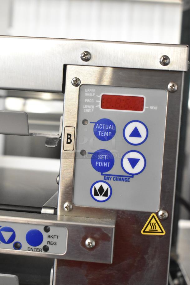 Prince Castle EHB24 Commercial Holding Bin control panel, showing temperature settings and stainless steel construction.