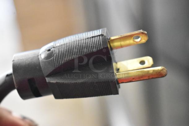 Close-up of an electrical plug for the Prince Castle EHB24 commercial holding bin.