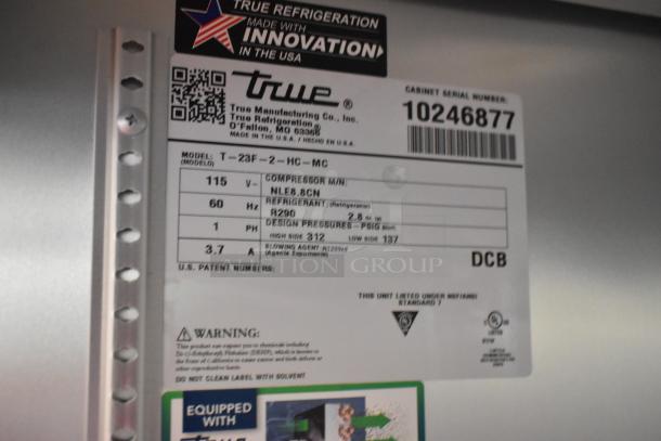 Label on 2021 True T-23F-2-HC-MC freezer shows model, voltage (115V), refrigerant (R290), and serial number.