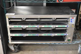 2021 Prince Castle EHB34-2 3-shelf, 12-pan holding bin. Stainless steel, 208-240V, 1 Phase, pristine condition.