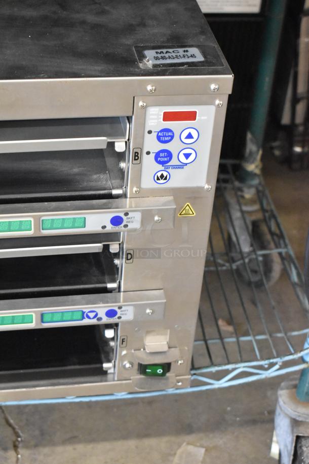 2021 Prince Castle EHB34-2 Commercial 3 Shelf/12 Pan Holding Bin, 208-240V, 1 Phase, featuring digital controls and good condition.