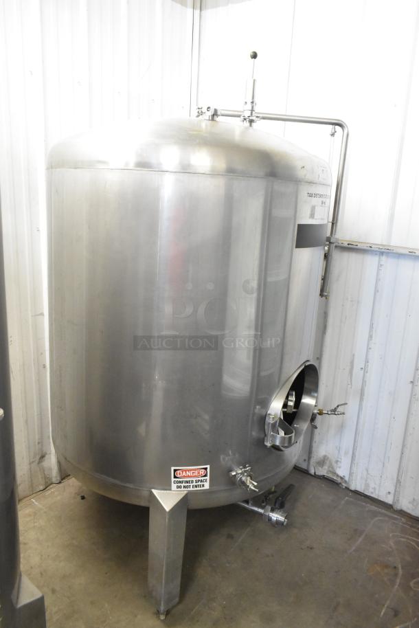Stainless steel 8.75 BBL, 367-gallon beer tank in excellent condition. Features tax determination label and safety warning.
