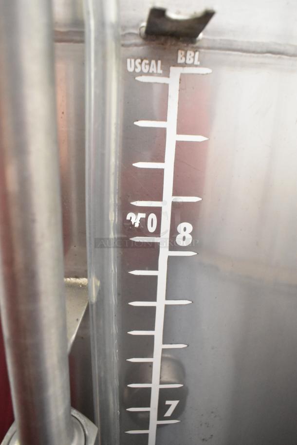 Stainless steel beer tank with volume markings in US gallons and BBL, showing 8.75 BBL capacity. Clean, commercial-grade.