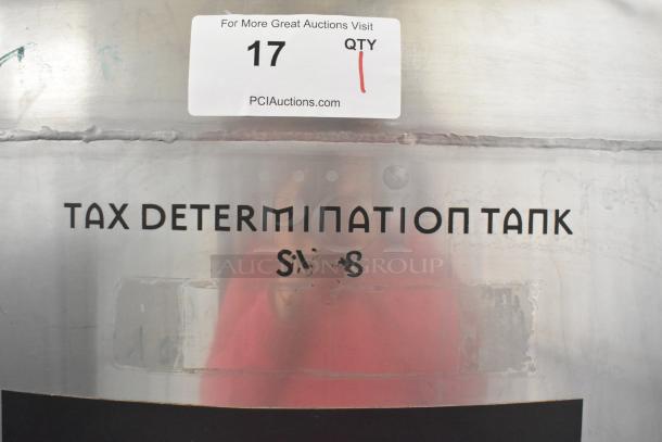 Stainless steel 367-gallon beer tax determination tank with label, showing number 17 from PCI Auctions.