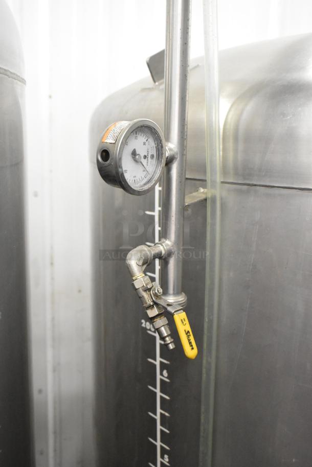 Stainless steel 8 BBL beer tax determination tank with pressure gauge, sight tube, valve, and volume markings, in excellent condition.