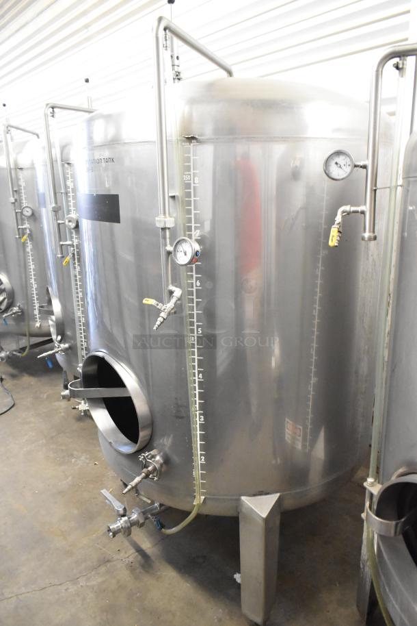 Stainless steel commercial 8.75 BBL beer tax determination tank with gauges and valves, in excellent condition.