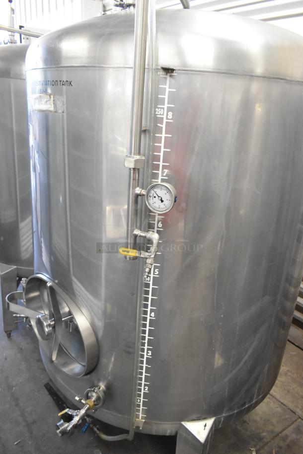 Stainless steel 8.75 BBL / 367-gallon beer tank with pressure gauge, sight glass, and valves. Used for tax determination.