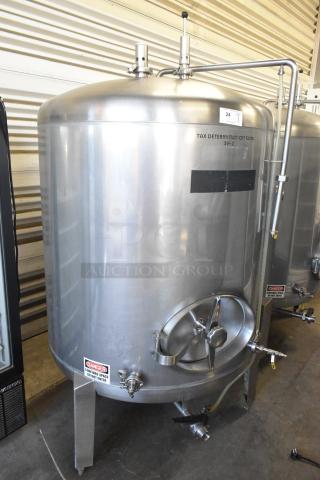 Stainless steel 8.75 BBL beer tax determination tank, floor style, clear beer tank, excellent condition, with safety labels.