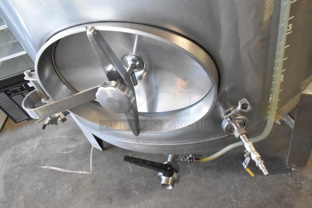 Stainless steel 8.75 BBL beer tank, floor style, with control valve and clear measurement markings, in good condition.