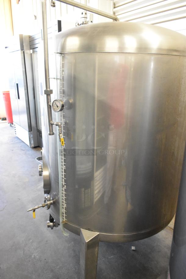 Stainless steel 8.75 BBL beer tank, 367-gallon capacity, floor style, with gauge, spigot, and measurement markings.
