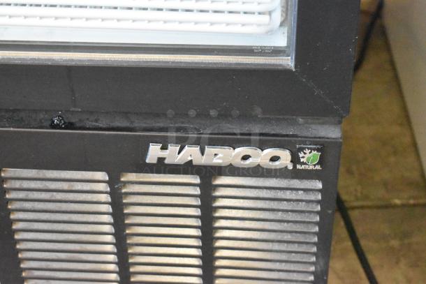 2019 Habco SE18 metal commercial single door reach-in cooler with poly coated racks, visible Habco logo, 115V, 1 phase.