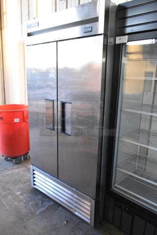 2022 True T-35-HC 2-door reach-in cooler with poly-coated racks, stainless steel finish, 115 volts, 1 phase.