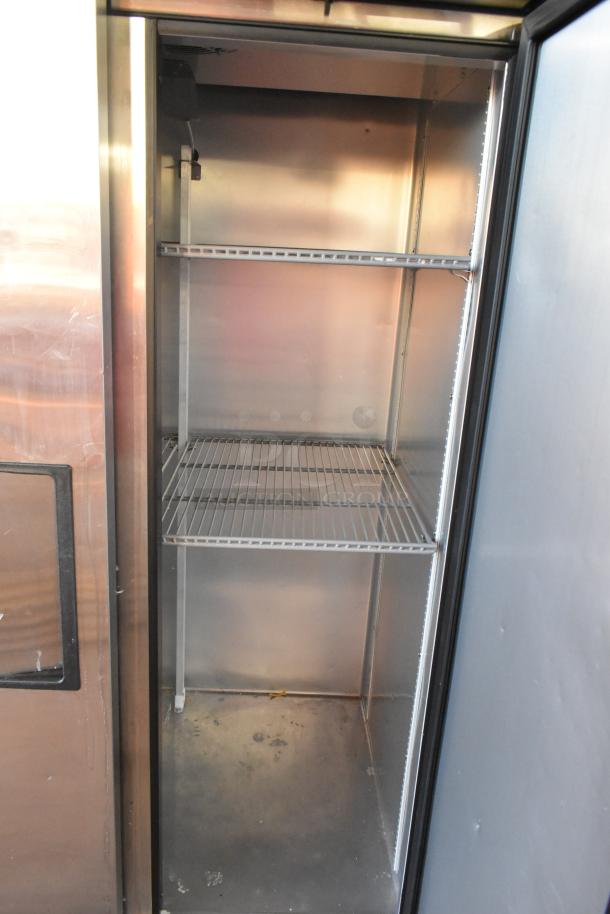 2022 True T-35-HC 2 Door Reach-In Cooler with poly-coated racks, 115 volts, 1 phase, excellent condition.