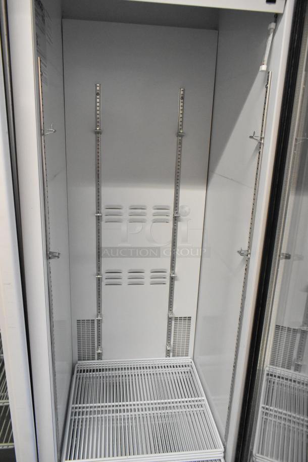 2019 Habco SE18 single door cooler, poly-coated racks, 115V, 1 phase. Excellent condition, ideal for merchandising.