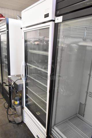 2021 True TSCI-600R-G-PH commercial cooler, single glass door, poly-coated racks, 115 volts, 1 phase, excellent condition.