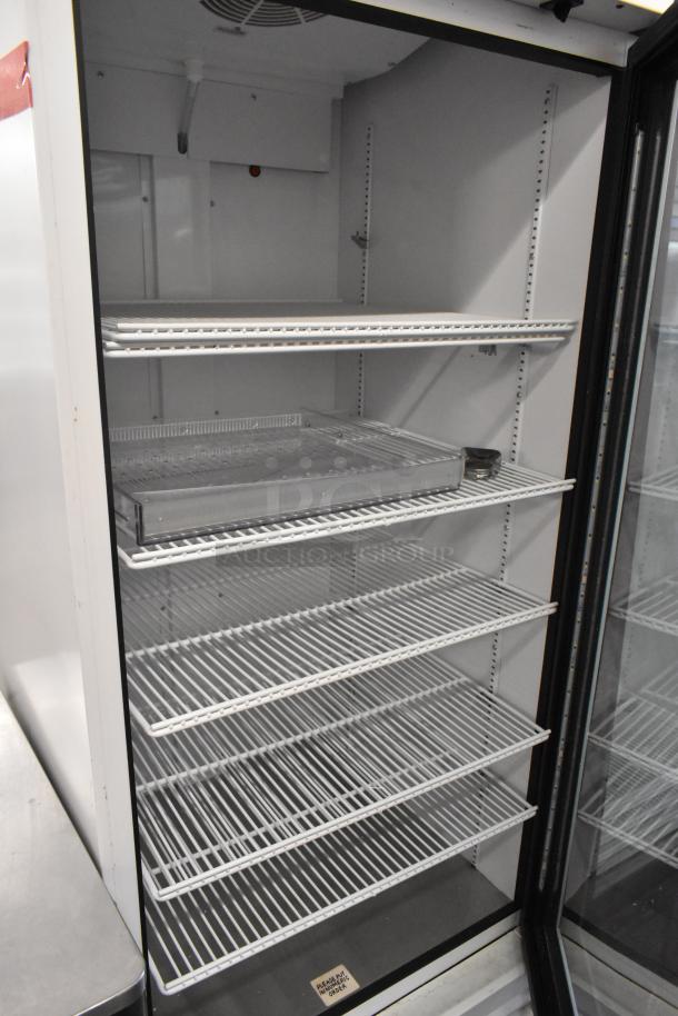 2021 True TSCI-600R-G-PH commercial cooler with glass door, poly coated racks, 115V, 1 Phase, excellent condition.