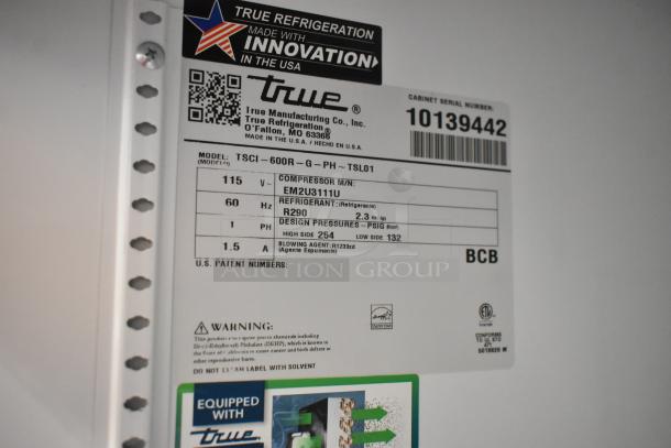 2021 True TSCI-600R-G-PH commercial cooler label, indicating 115 volts and R290 refrigerant. Model and barcodes visible.
