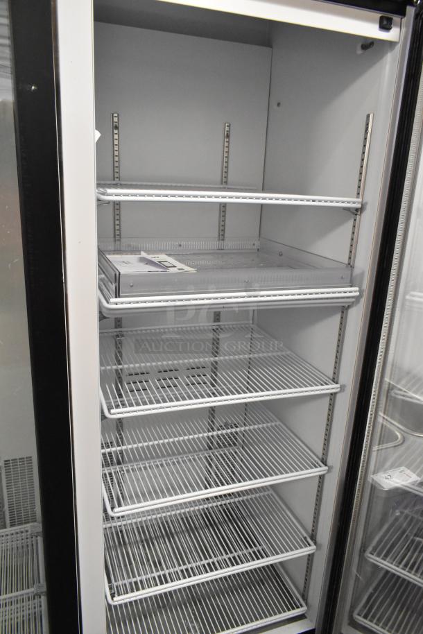 2019 Habco SE18HC reach-in cooler, single door, poly-coated racks, 115 volts, 1 phase, excellent condition.