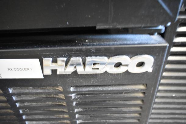 Habco SE12 single door cooler merchandiser close-up with logo. Includes poly coated racks, 115V, 1 phase.