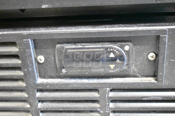 Habco SE12 commercial cooler thermostat display, showing temperature control panel with colder and warmer settings.