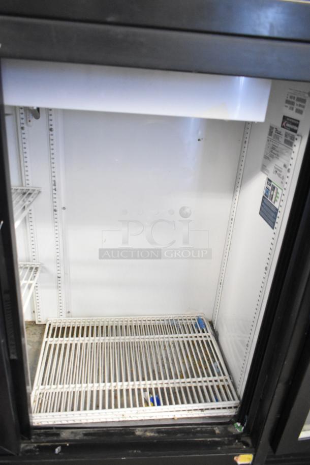 2019 True GDM-41SL-48-HC-LD commercial cooler, 2-door, poly-coated racks, 115 volts, 1 phase, clean interior.