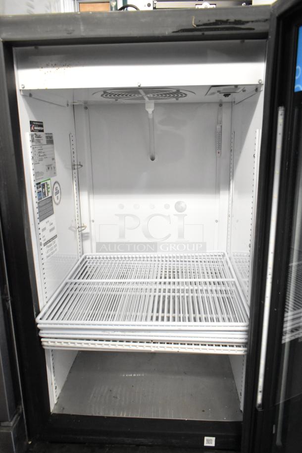 2023 True GDM-08-HC Single Door Cooler Merchandiser with poly-coated racks, 115 volts, 1 phase, excellent condition.
