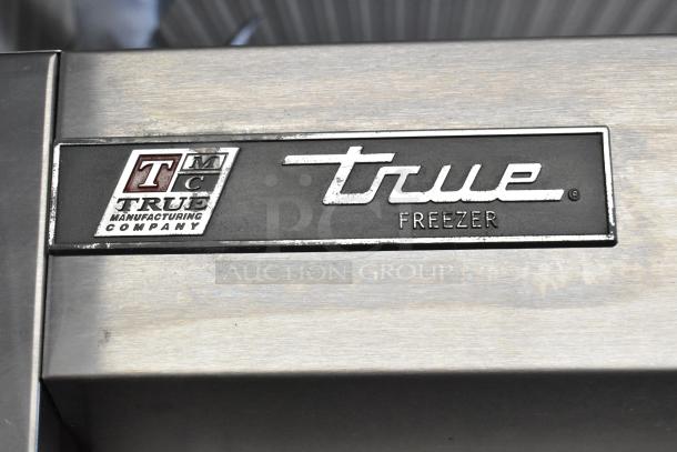2017 True T-19F commercial freezer, single door, 115V, poly coated racks, showing brand logo on stainless steel surface.