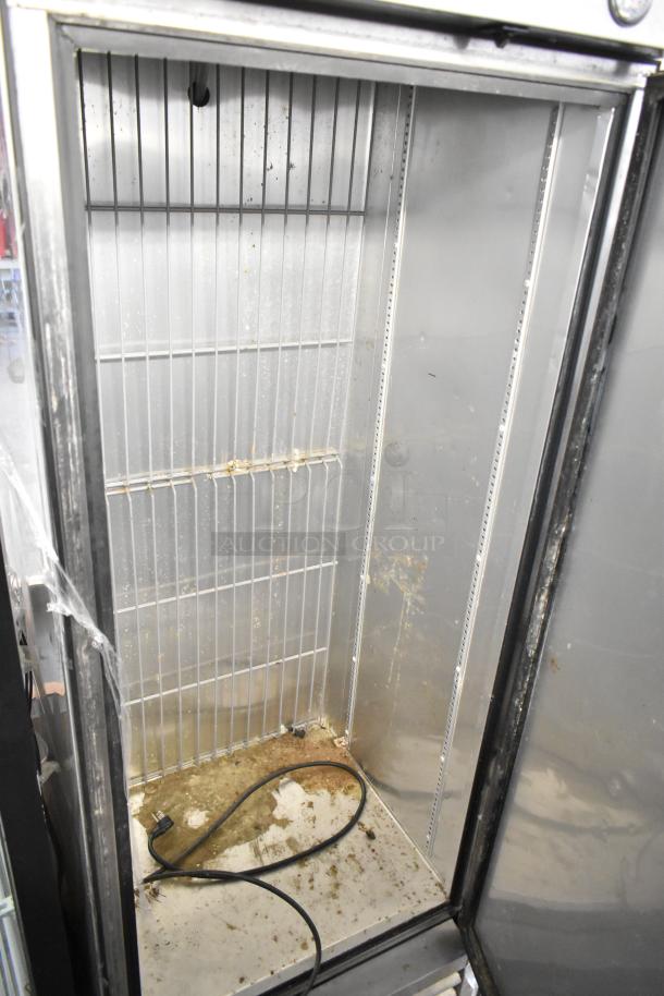 2017 True T-19F commercial single door reach-in freezer, poly-coated racks, 115 volts, 1 phase. Requires cleaning.