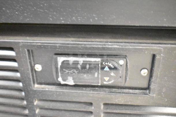 2019 Habco SE18 commercial reach-in cooler, black exterior, poly-coated racks, temperature control panel, 115V, 1 phase.