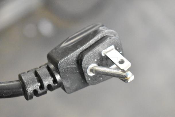 Close-up of a power plug for a Habco SE18 Commercial Single Door Reach In Cooler Merchandiser. 115 Volts, 1 Phase.