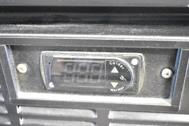Close-up of the Habco SE18 cooler's digital temperature control, showing a display panel with colder and warmer settings.