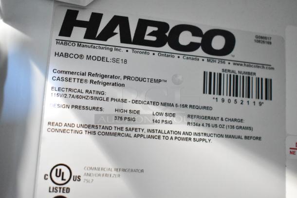 2019 Habco SE18 commercial cooler label showing model, electrical rating 115V/2.7A, refrigerant R134a, UL listed.